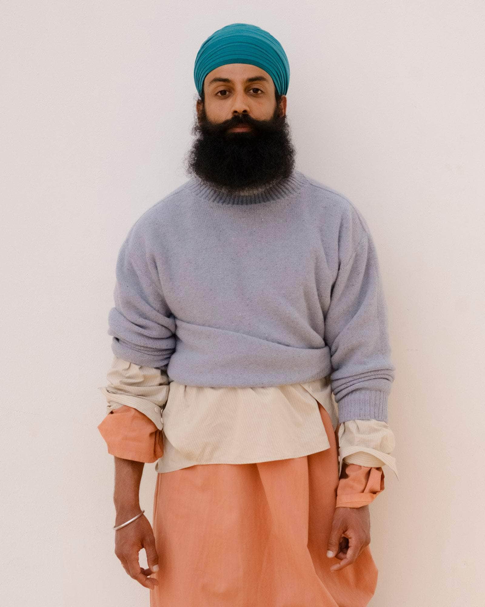 BASERANGE KNITTED TIER SWEATER