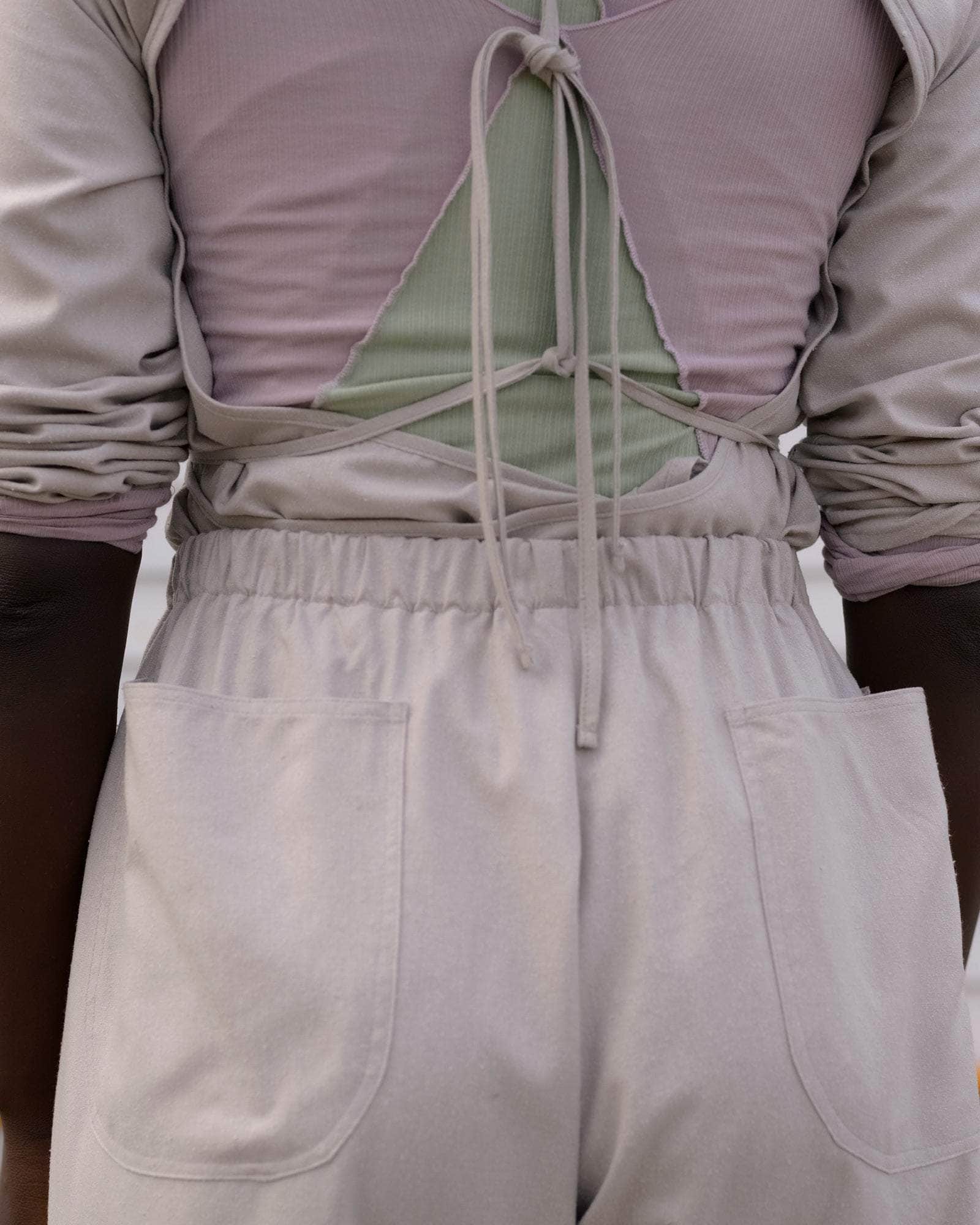 BASERANGE WOVEN LONG SLEEVE APRON TOP