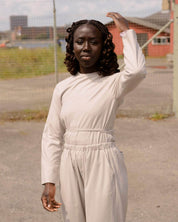 BASERANGE WOVEN LONG SLEEVE APRON TOP