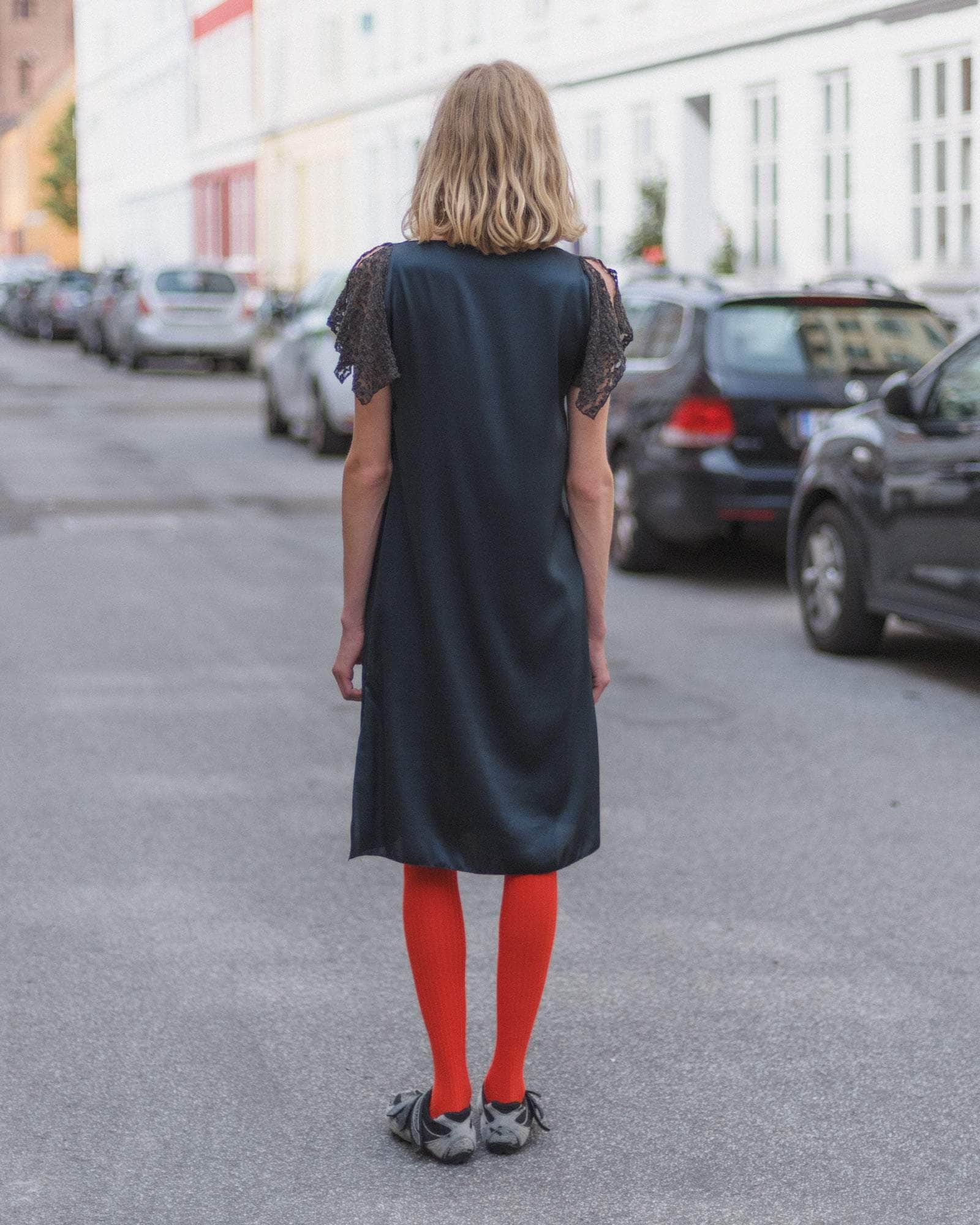 gray dress with red shoes Silver Dress Red Shoes White Table Stock Photo 408228322