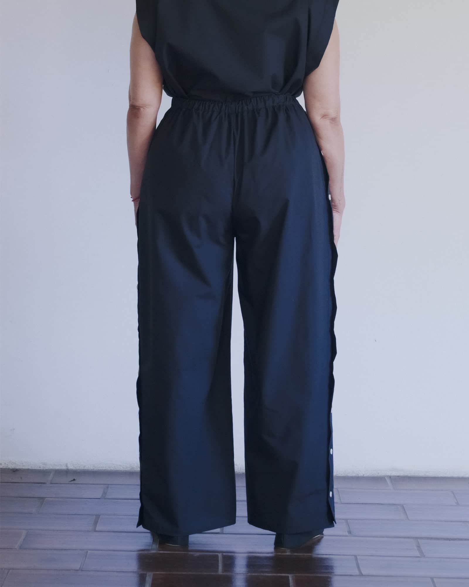 BASERANGE WOVEN PART PANTS