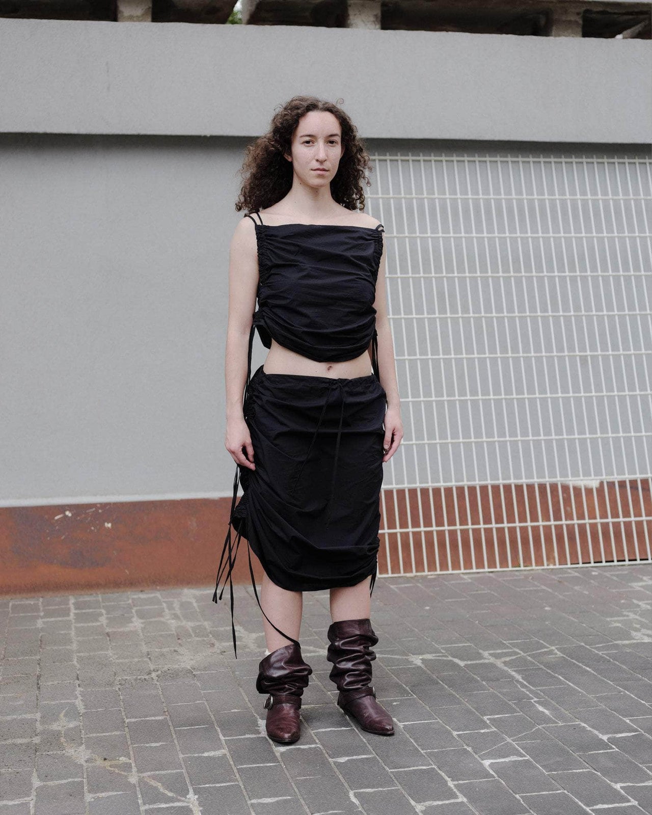 Cargo strap outlet skirt