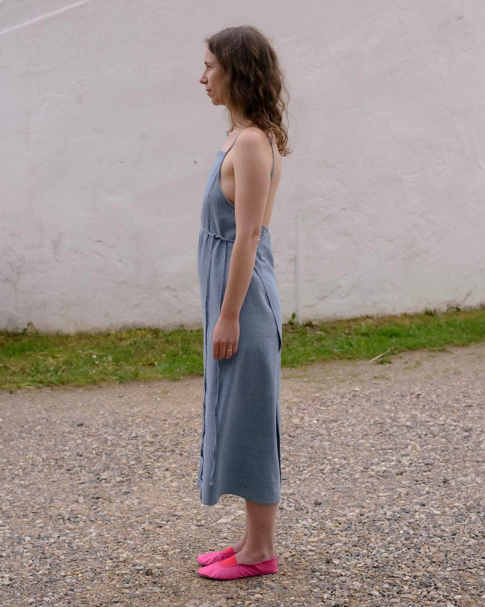 Yumi Apron Dress in Light blue wash | Silk cotton denim | Baserange Yumi Apron Dress in Light blue wash | Silk cotton denim | Baserange